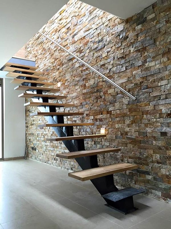 escaleras interiores modernas acero y madera piedra